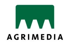 「AGRIMEDIA」という文字と、その上に緑色で山型またはギザギザの抽象的な図形が描かれた企業ロゴです
